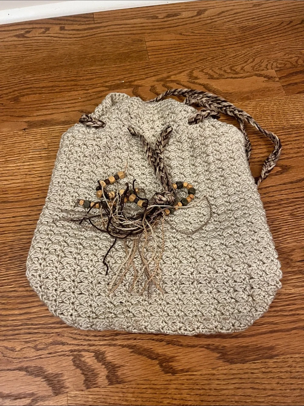 The Sak Crochet Drawstring Backpack Purse in Ivory